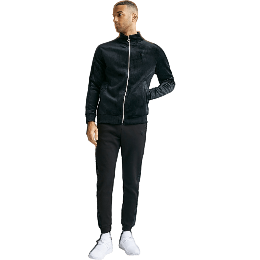 Pantalon noir à revers et bandes opulentes