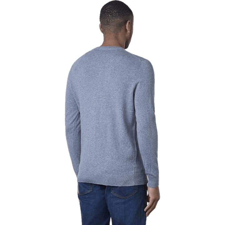 Pull mi-long à col en V en coton mérinos