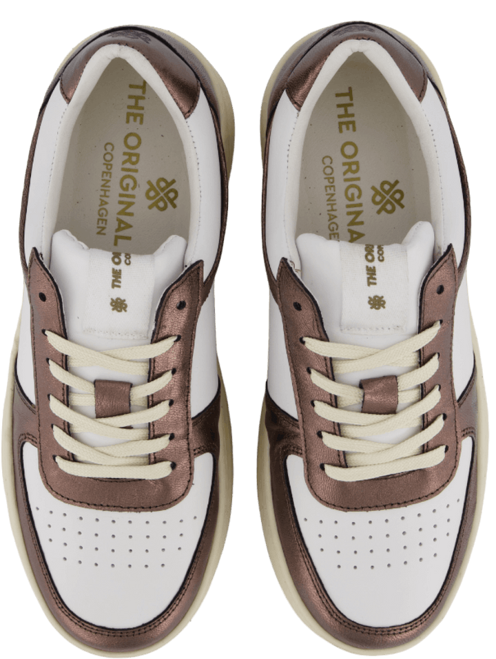 A Ella 2.0 em pele branca/bronze