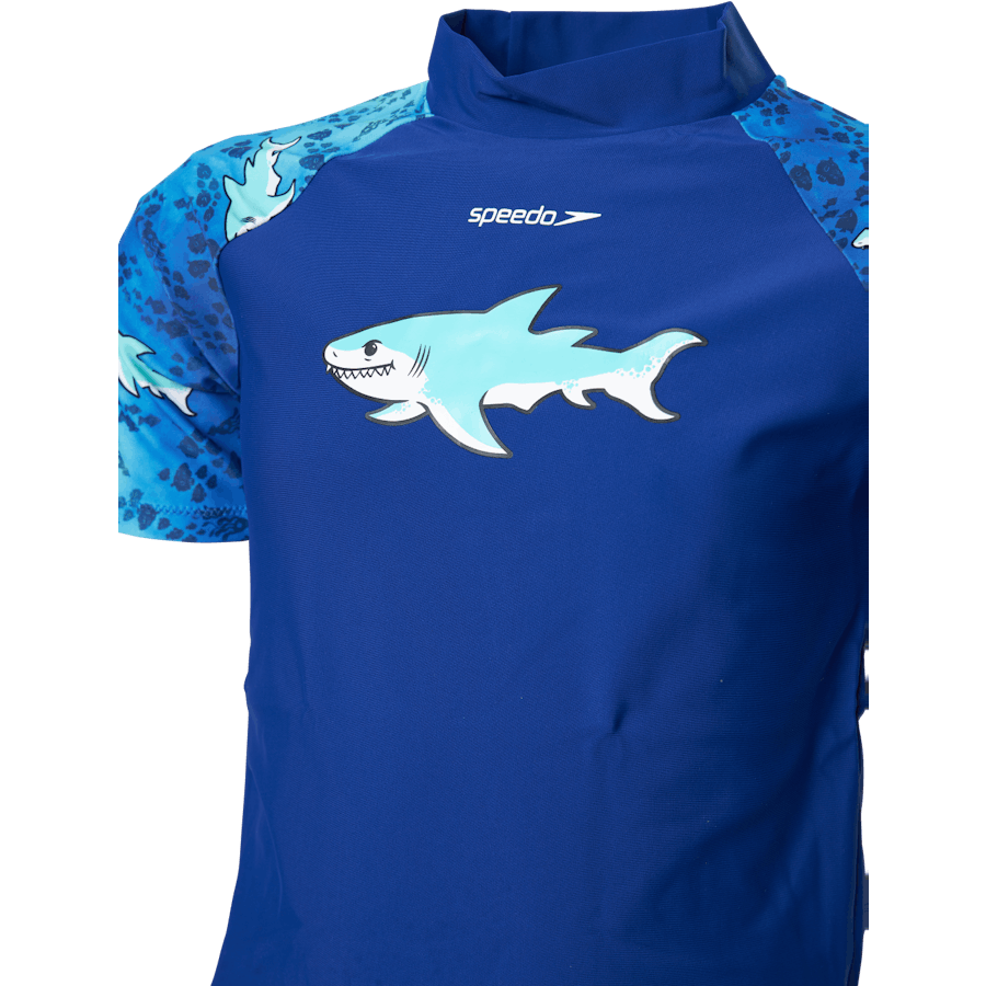 Top e pantaloncini con protezione solare blu