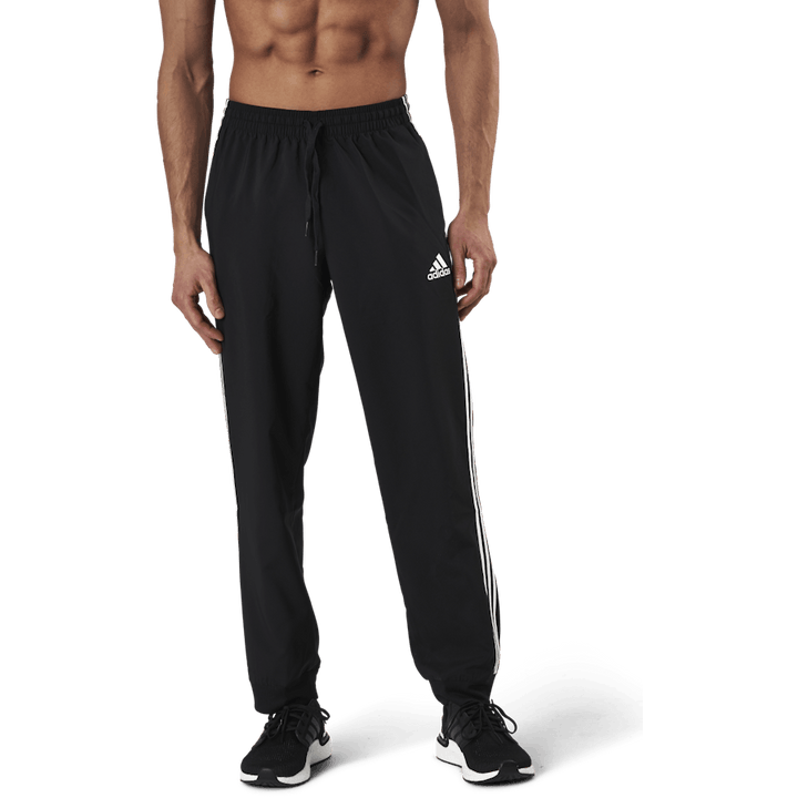 Pantalon Essentials à revers fuselés et 3 bandes, noir