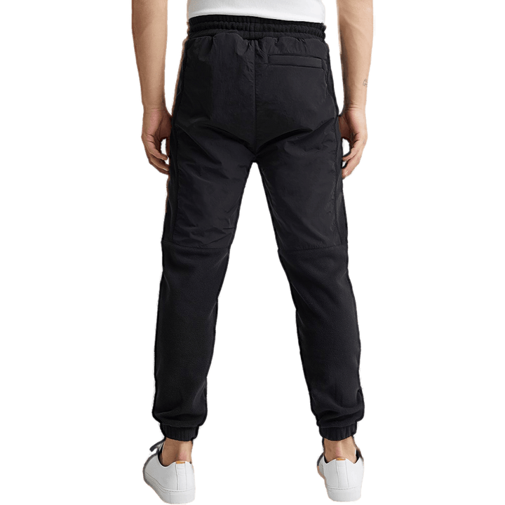 Pantalón Hybrid Pro con puño elástico Negro
