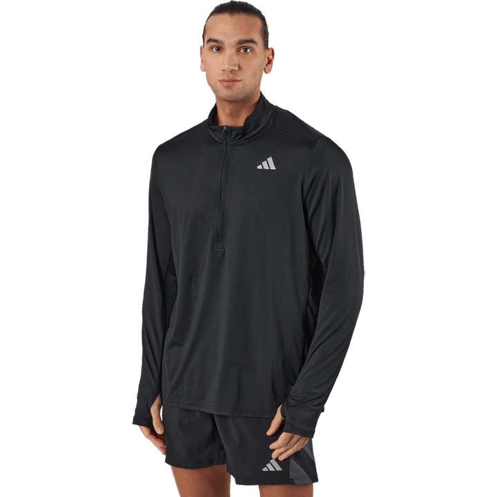 Own the Run 1/2 Zip Langarm-Top Schwarz