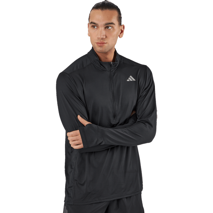 Own the Run 1/2 Zip Langarm-Top Schwarz