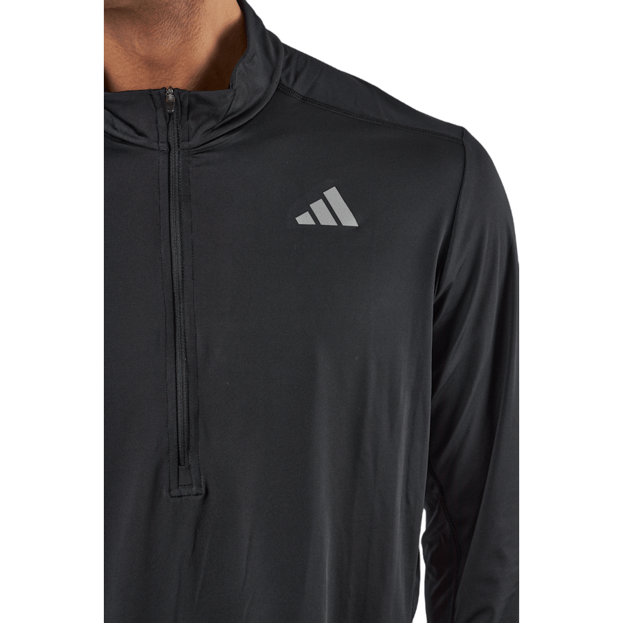 Own the Run 1/2 Zip Langarm-Top Schwarz