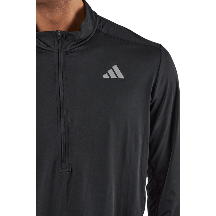 Own the Run 1/2 Zip Langarm-Top Schwarz