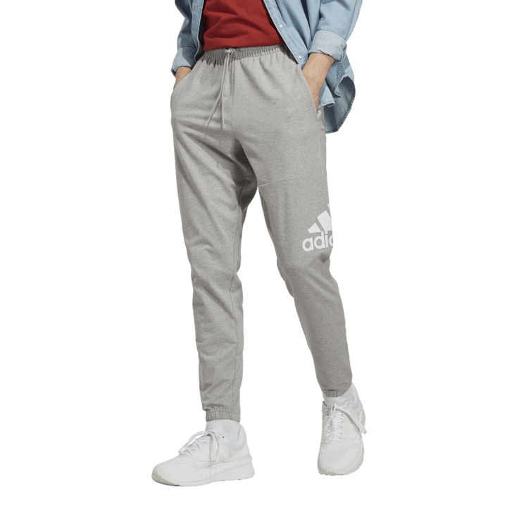 Essentials Enojni džersi s koničastim trakom Badge of Sport Joggers sive barve