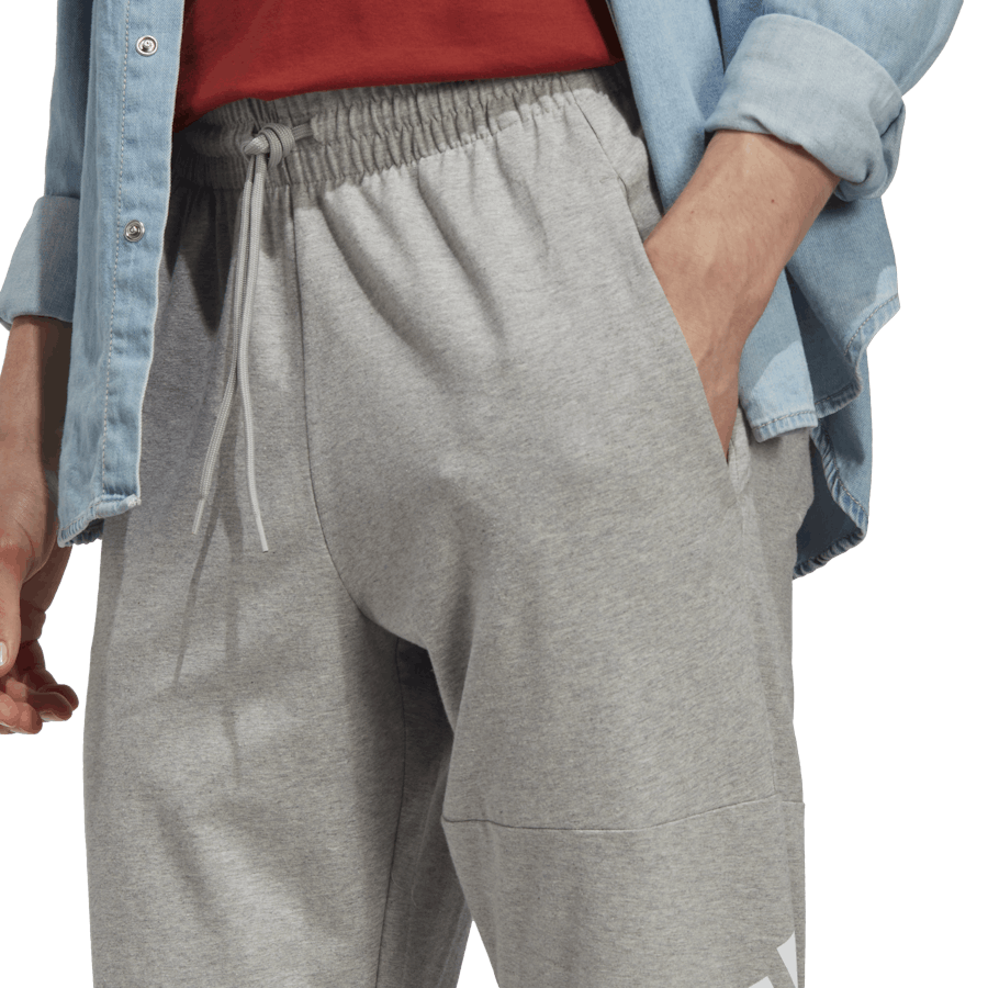 Essentials Enojni džersi s koničastim trakom Badge of Sport Joggers sive barve