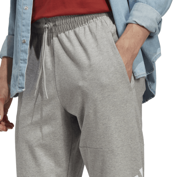 Essentials Enojni džersi s koničastim trakom Badge of Sport Joggers sive barve